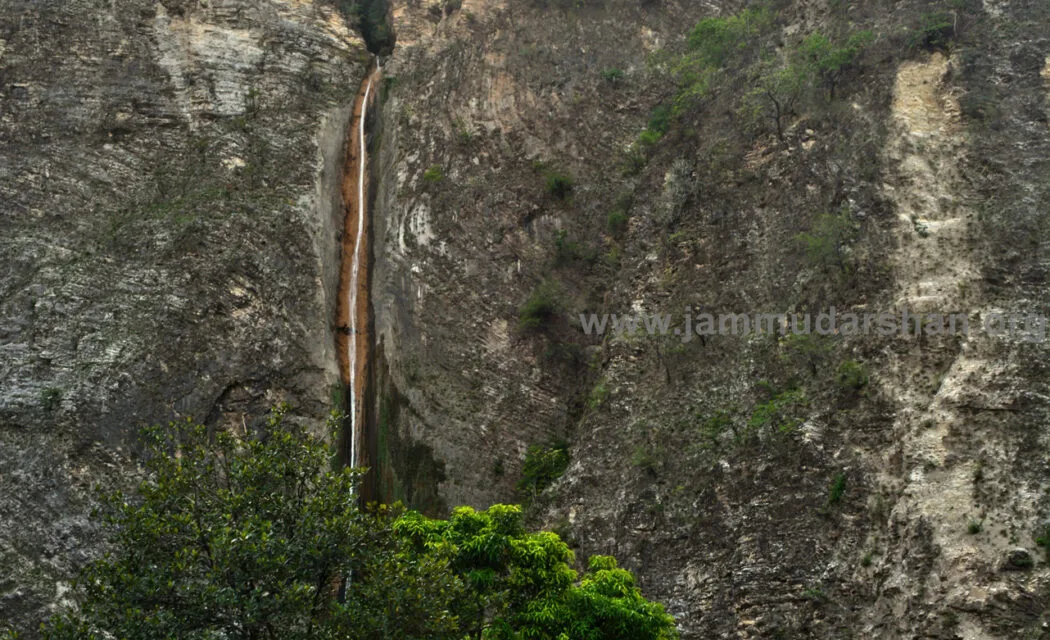 Siarh Baba temple with hill waterfall near Chenab River, Reasi